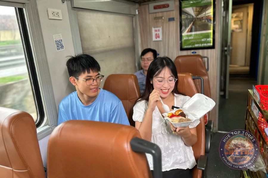 Tourists eating Hue specialty