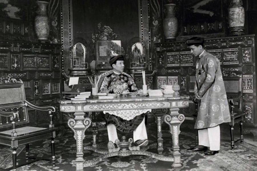 Khai Dinh Emperor and his attendant